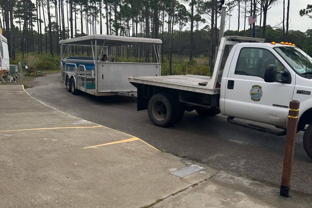 Topsail Hill Preserve State Park Campground Review: The tram provides transportaion to the beach and lake. 