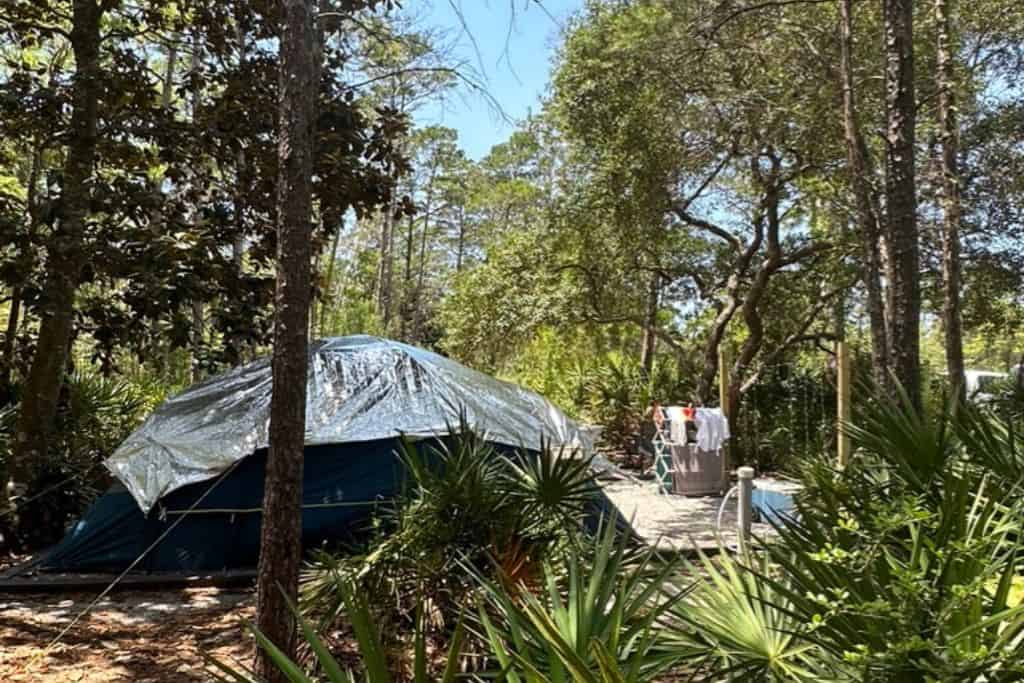 Topsail Hill Preserve State Park Campground Review: Tent spots include electric, water and a clothes line. 