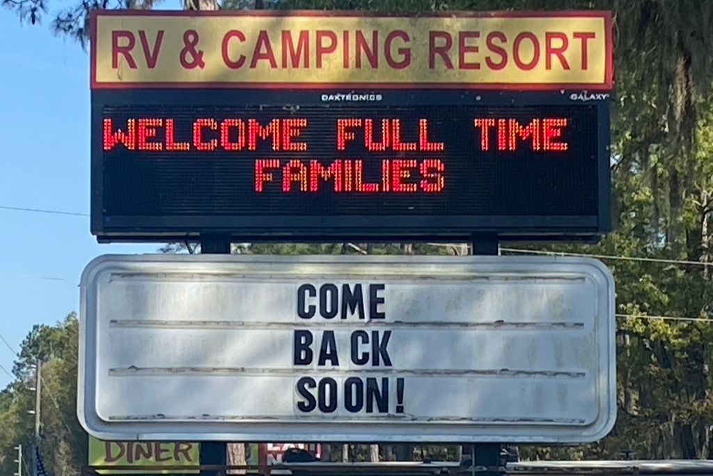 Campground sign welcoming full time families. 